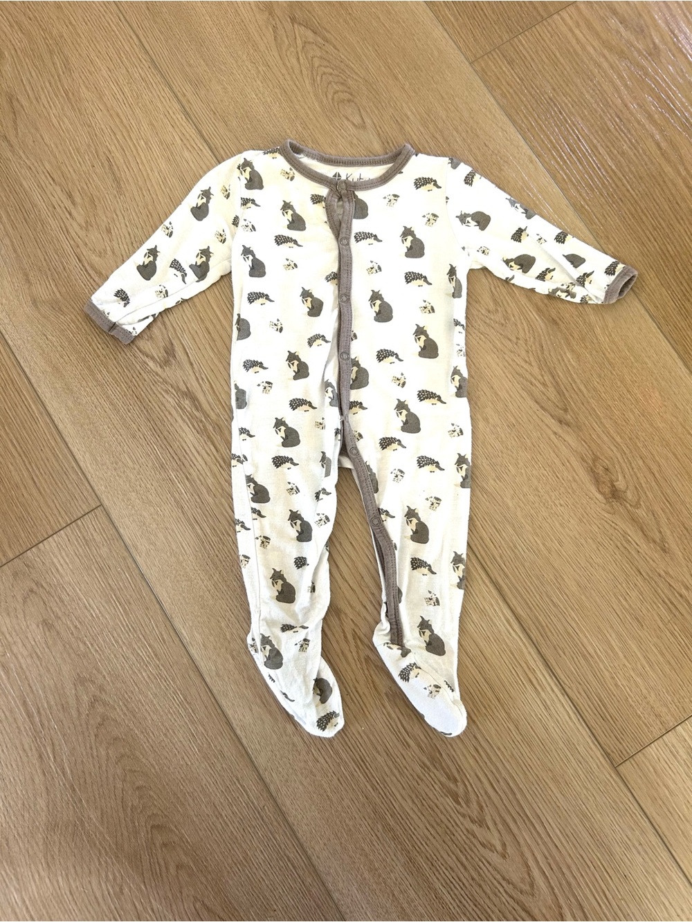 RETIRED PRINT Kyte Baby snap footie Woodland 0-3